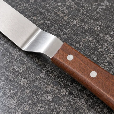 Close view of the wooden handle rivets and offset steel neck